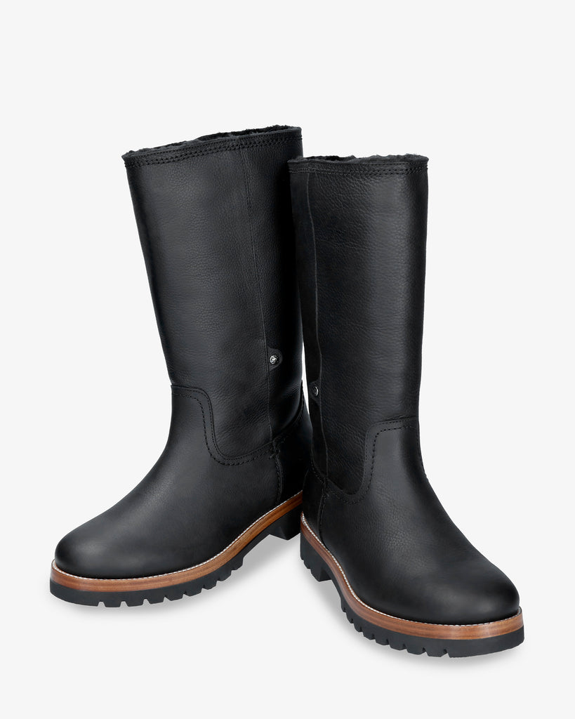 Bambina botas de piel con forro interior de pelo. negro