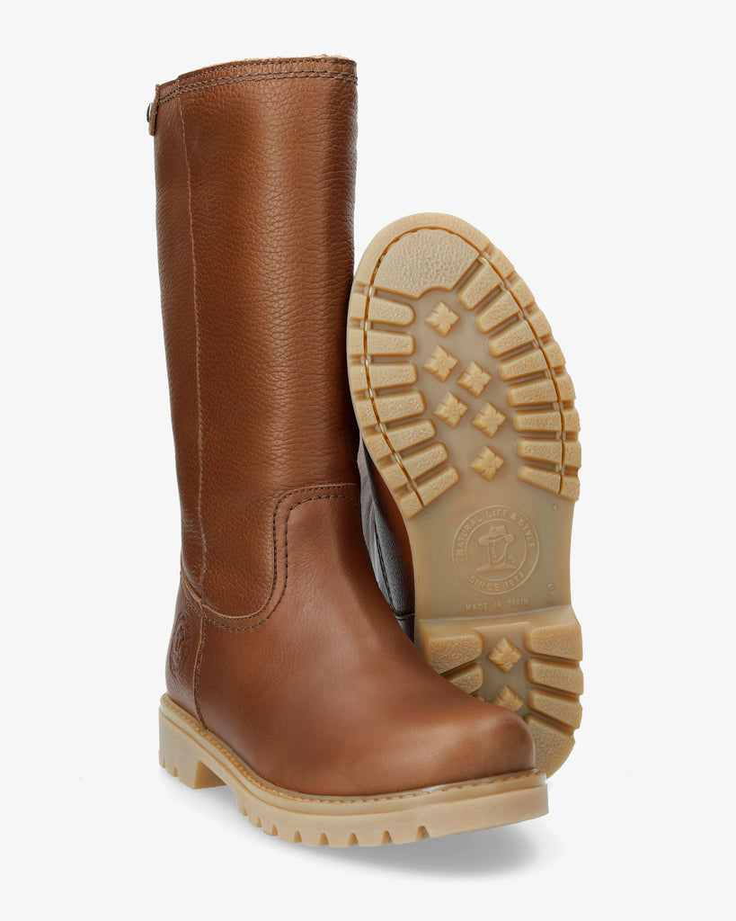 Bambina botas de piel con forro interior de pelo. cuero