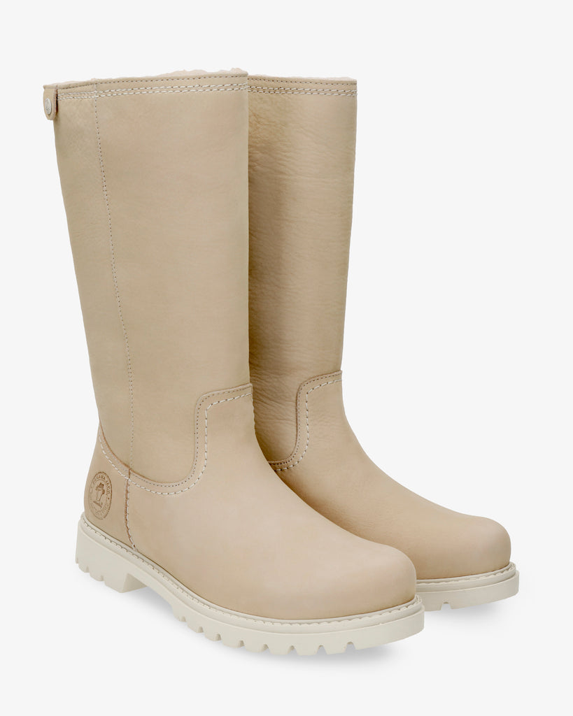 Bambina botas de piel con forro interior de pelo. crudo