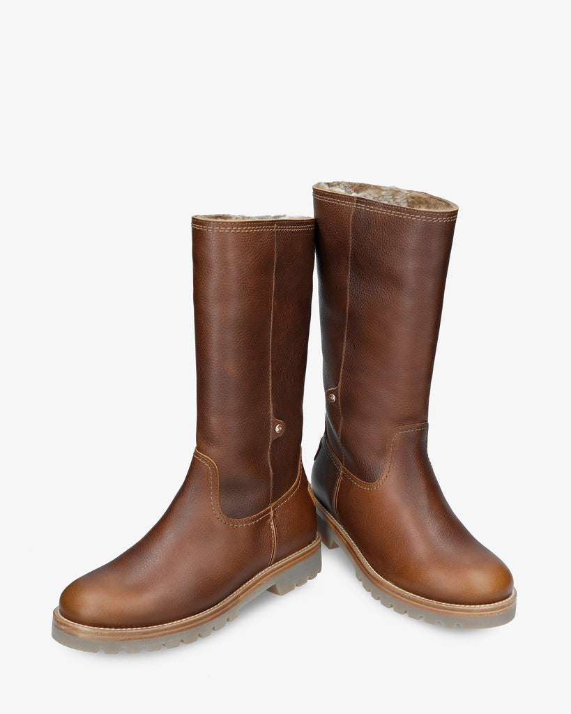 Bambina botas de piel con forro interior de pelo. cuero