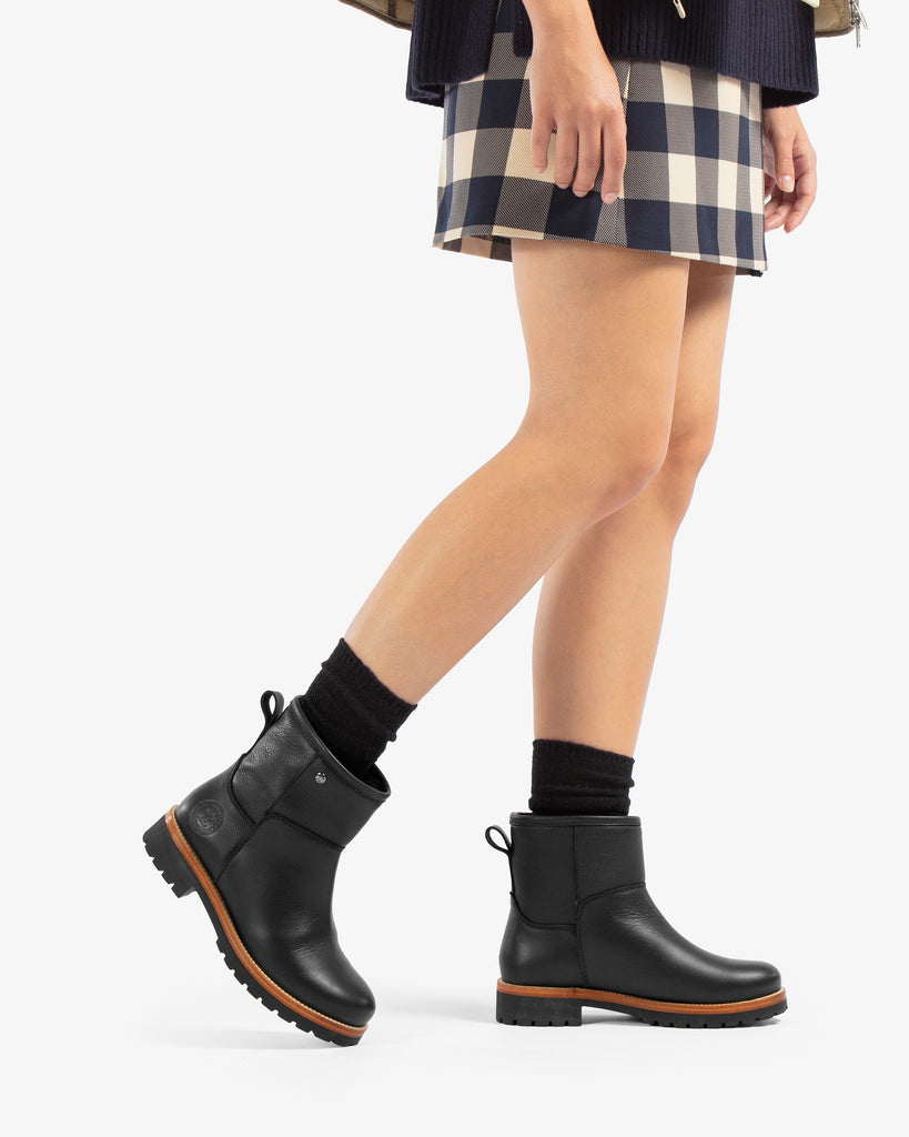 Grace botas de piel con forro interior de pelo. negro