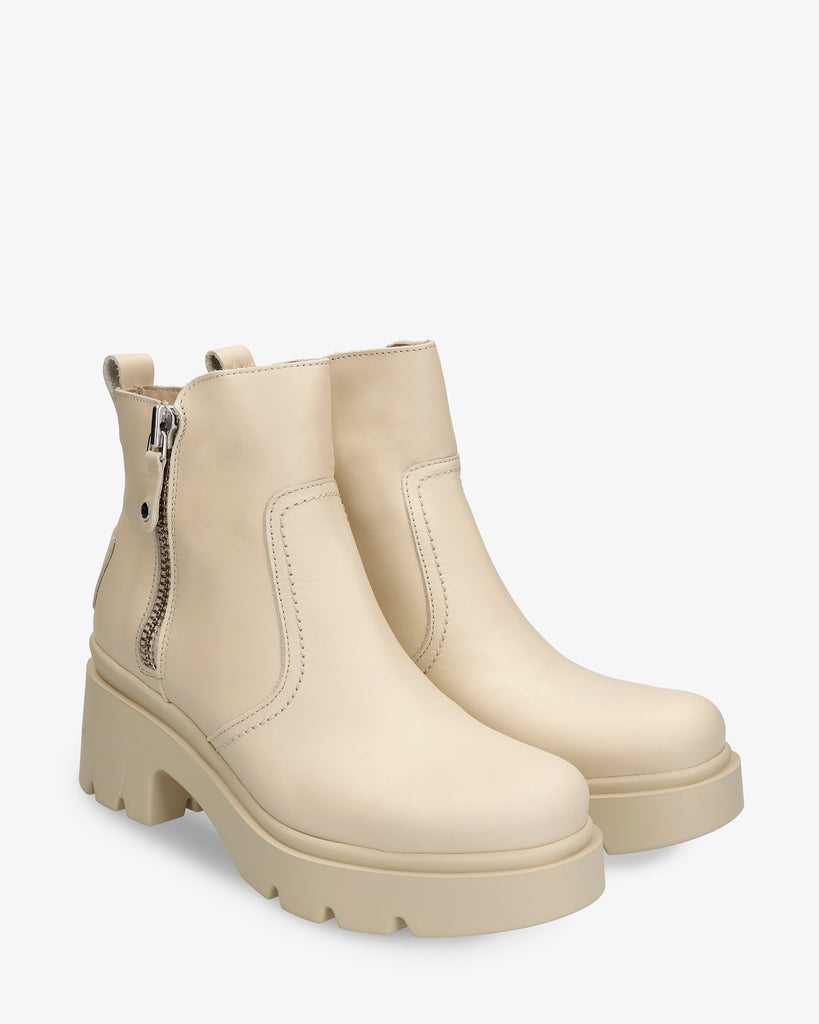 Phuket botín de piel con forro interior de pelo. crudo